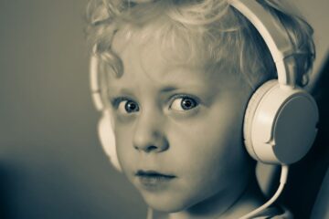 child with headphones boy child headphones white music